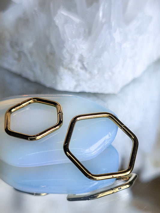 Gylltur clicker - hexagon